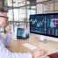 An investor analyzing market trends and Serbia’s capital market data on a computer screen.